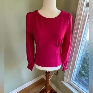Anthropologie long sleeve top garnet red S. Gathered cuffs. Crepe looking bodice